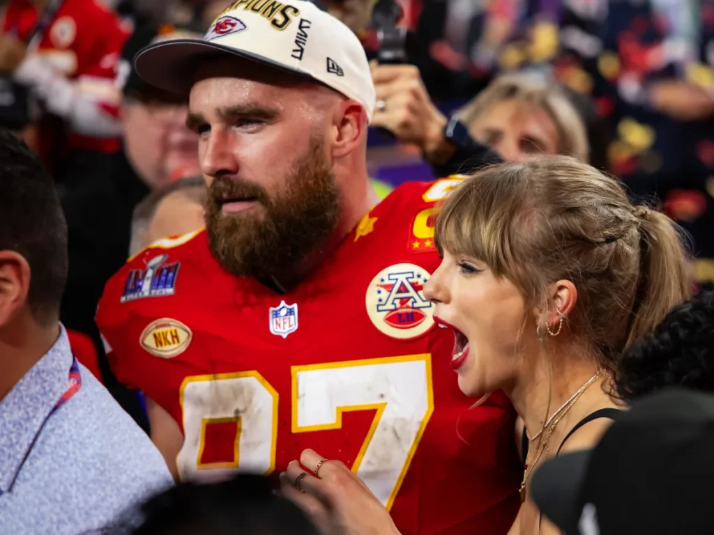 Taylor Swift cheering Travis Kelce