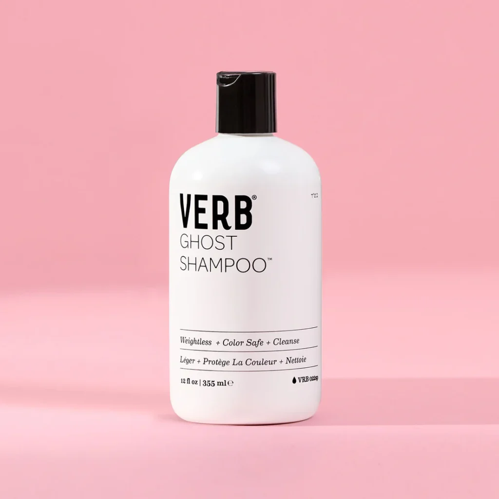 Verb Ghost Shampoo bottle on a sleek, minimalist bathroom counter. 