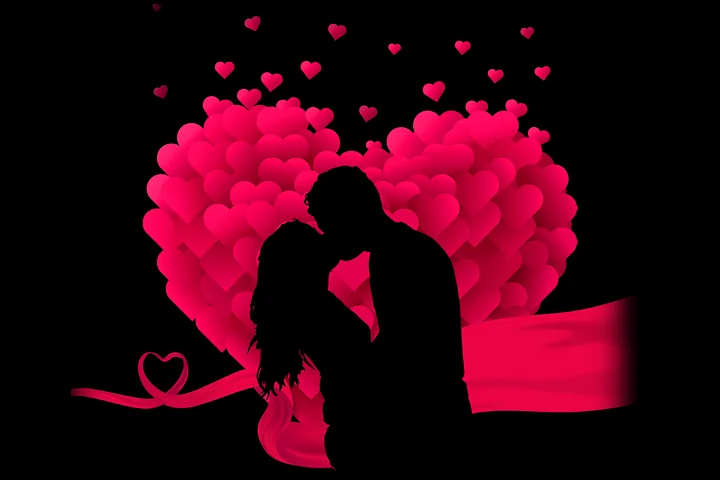 A silhouetted couple shares a kiss against a backdrop of hearts, embodying the essence of romantic love messages.